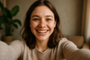 a female selfie looking happy and smiling